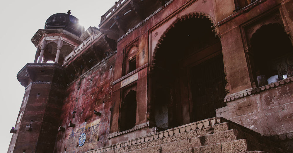 How to soft wash red algae stains from render