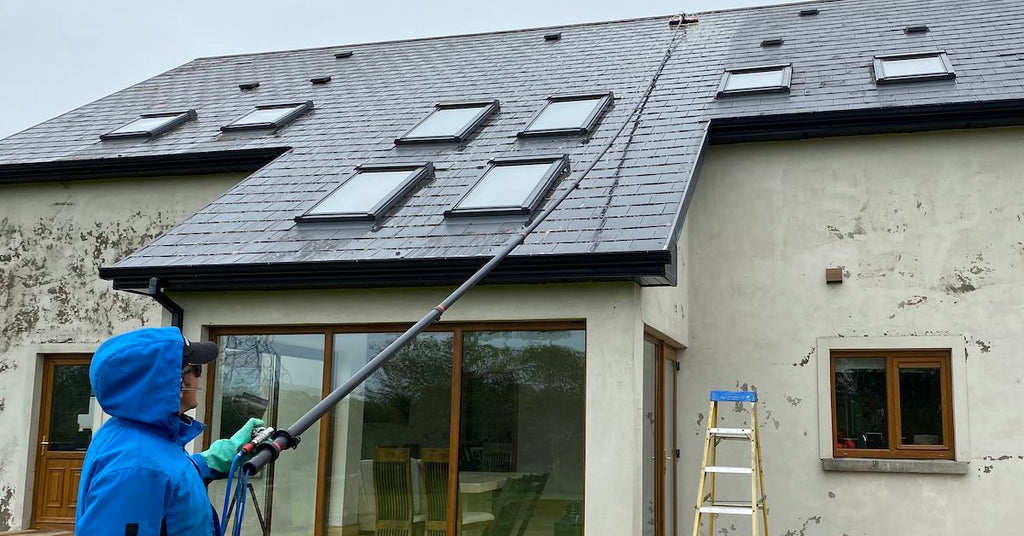 Should you scrape moss from a roof before soft washing?